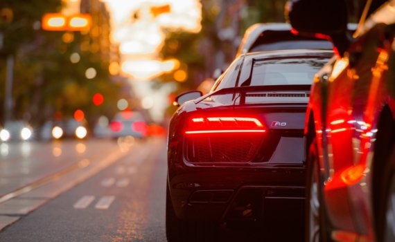 black Audi R8 parked beside road
