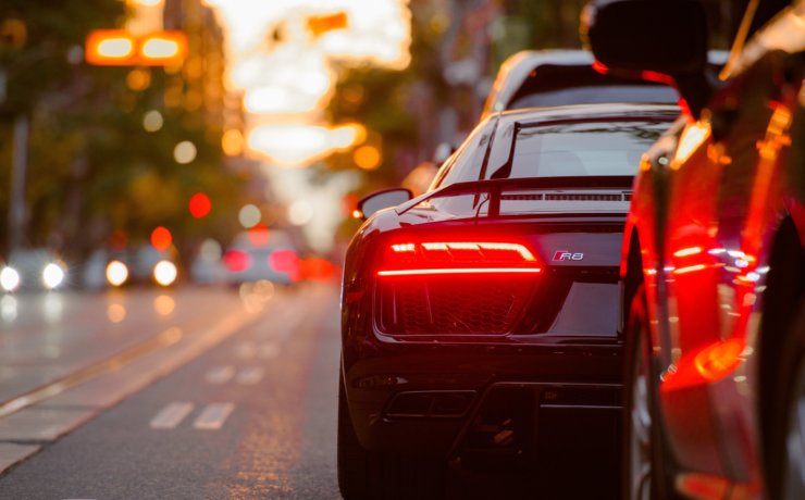 black Audi R8 parked beside road