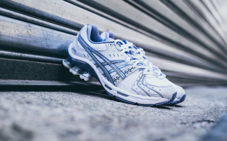 pair of white-and-purple Asics sneakers