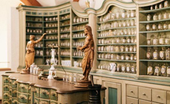man and woman statuettes