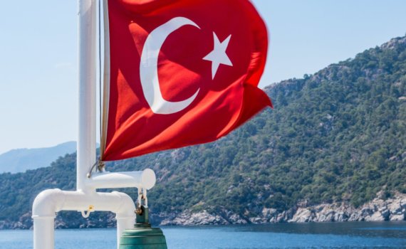 Turkey flag on pole with bell