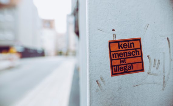 kein mench ist illegal sign sticker
