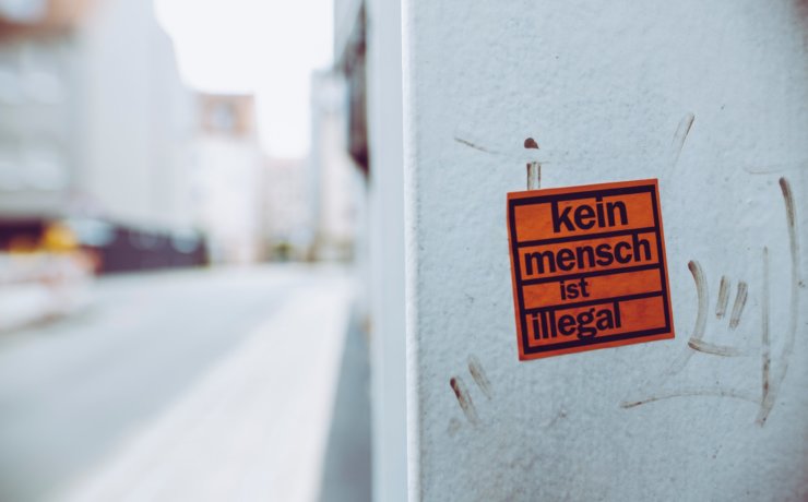 kein mench ist illegal sign sticker