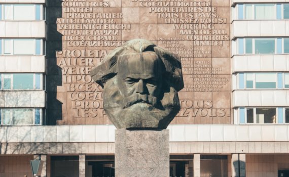 mans face concrete statue